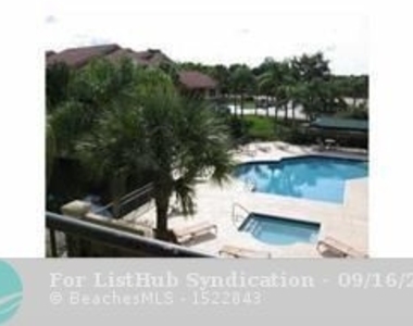 8781 Wiles Rd - Photo Thumbnail 10