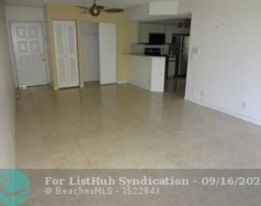 8781 Wiles Rd - Photo Thumbnail 7