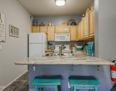 14950 W Mountain View Boulevard - Photo Thumbnail 24