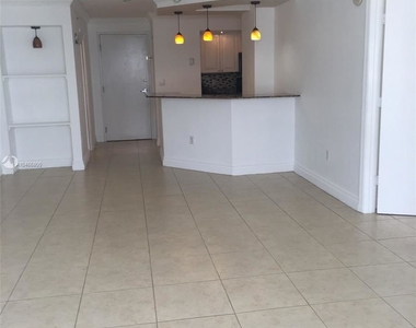 6917 Collins Ave - Photo Thumbnail 2