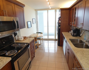 9341 Collins Ave - Photo Thumbnail 7