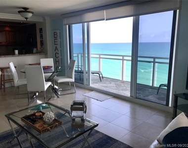 6917 Collins Ave - Photo Thumbnail 0