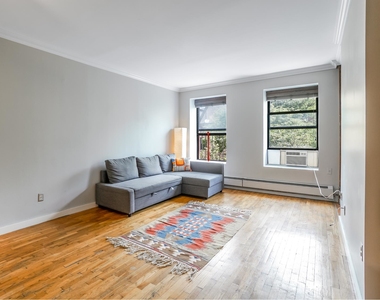 446 W 47th St - Photo Thumbnail 1