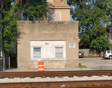 7621 South Exchange Avenue - Photo Thumbnail 0