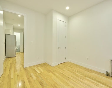 411 W 48th Street - Photo Thumbnail 2