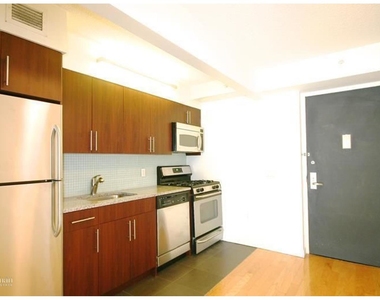 555 West 23rd St - Photo Thumbnail 2