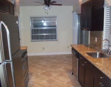 9677 Sandalfoot Boulevard - Photo Thumbnail 2