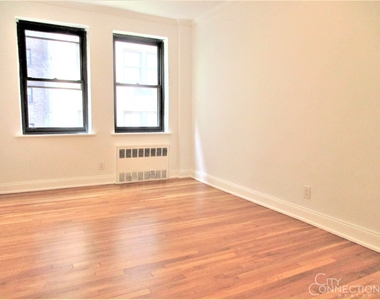 412 E 50th St - Photo Thumbnail 0