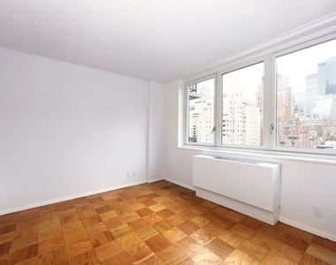 115 East 34th Street - Photo Thumbnail 2