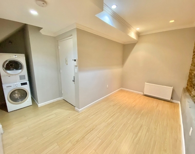 E 1st St - NO FEE - 1 Bed w/ Finished Basement - Photo Thumbnail 3