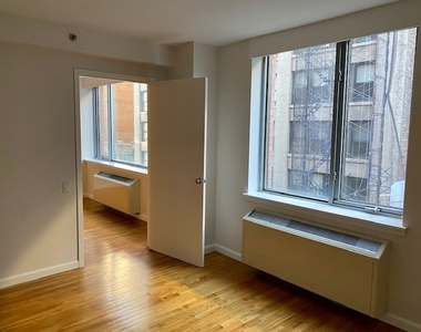 120 West 21st Street - Photo Thumbnail 2