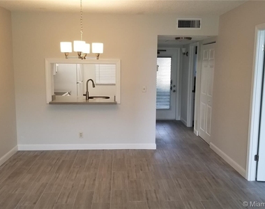 9440 Poinciana Pl Apt 107 - Photo Thumbnail 1