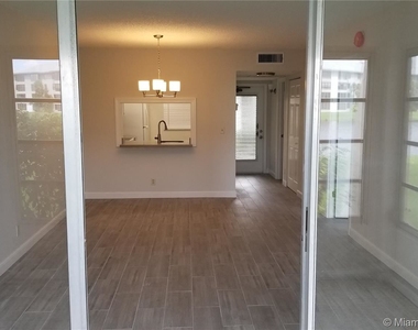 9440 Poinciana Pl Apt 107 - Photo Thumbnail 2