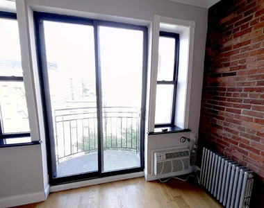 102 East 7th Street - Photo Thumbnail 4