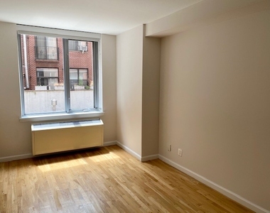 120 West 21st Street - Photo Thumbnail 1