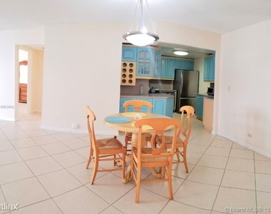 6039 Collins Ave - Photo Thumbnail 1