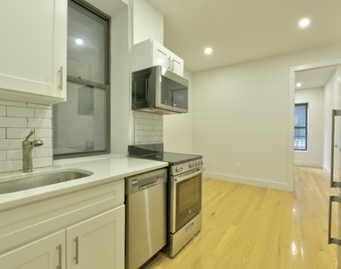 411 W 48th Street - Photo Thumbnail 0