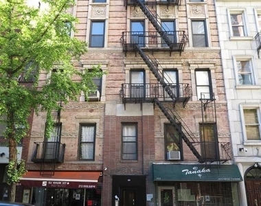 East 51 St - Photo Thumbnail 6