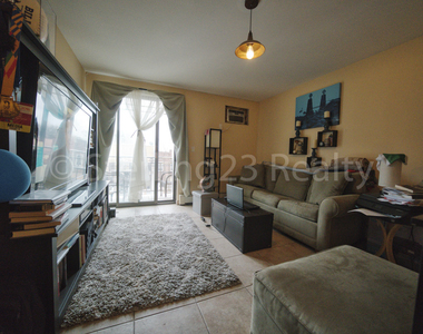 27-11 23rd Avenue - Photo Thumbnail 0