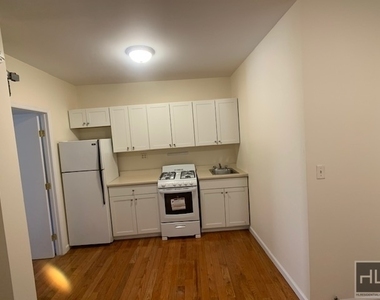 334 E 65th St - Photo Thumbnail 2