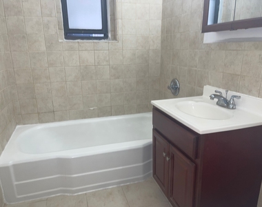 96-09 66th Avenue - Photo Thumbnail 4