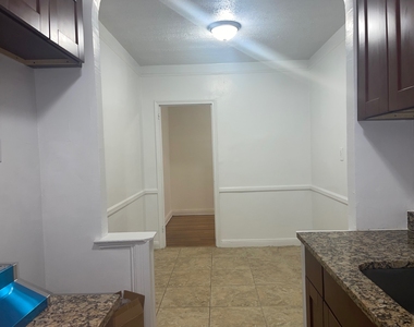 96-09 66th Avenue - Photo Thumbnail 2
