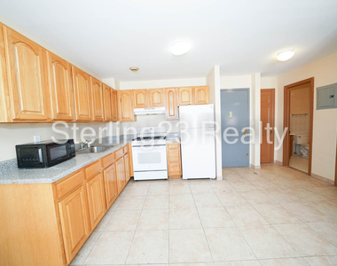 27-11 23rd Avenue - Photo Thumbnail 2