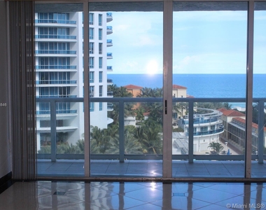 5900 Collins Ave - Photo Thumbnail 0