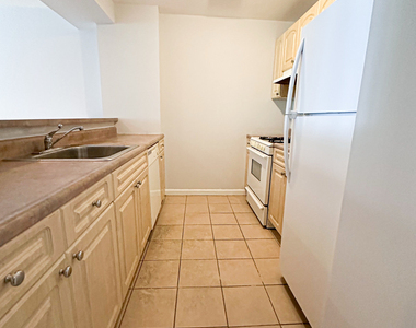 67-25 Exeter Street - Photo Thumbnail 2