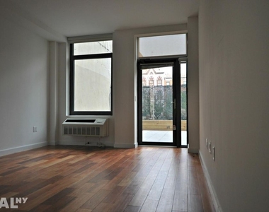 321 East 3rd Street - Photo Thumbnail 2