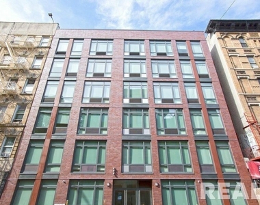 321 East 3rd Street - Photo Thumbnail 0