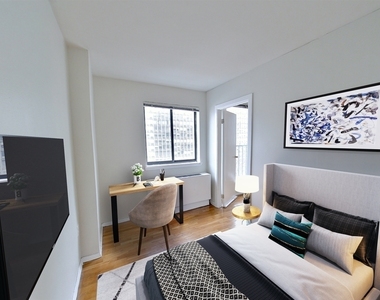 312 East 30th Street - Photo Thumbnail 1