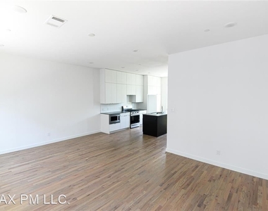 427 W 10th St Unit 103 - Photo Thumbnail 1