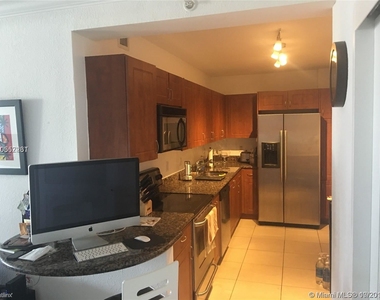 6969 Collins Ave - Photo Thumbnail 2