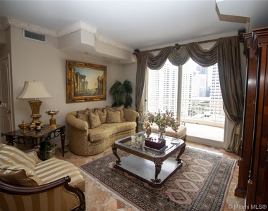 888 Brickell Key Dr - Photo Thumbnail 1