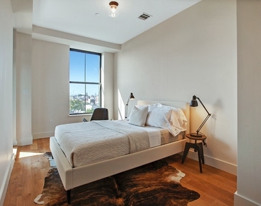 55-27 Myrtle Ave #203 - Photo Thumbnail 1