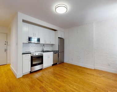 242 West 10th Street - Photo Thumbnail 3