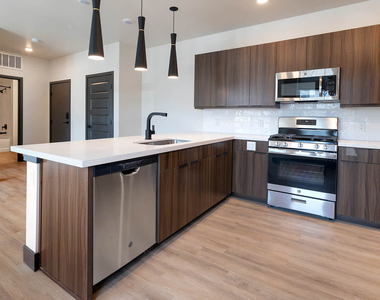 11700 E 26th Ave - Photo Thumbnail 2