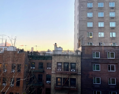 East 12th Street - Photo Thumbnail 1