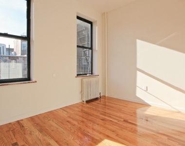 214 East 10th Street - Photo Thumbnail 0