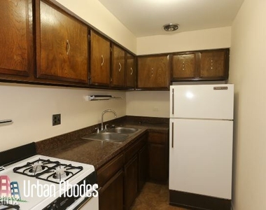 445 W Barry Ave 1 - Photo Thumbnail 1