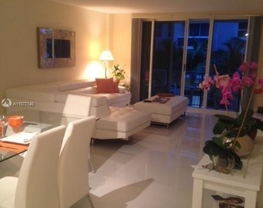 9195 Collins Ave - Photo Thumbnail 2