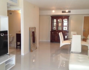 9195 Collins Ave - Photo Thumbnail 3