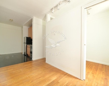 338 East 61st Street - Photo Thumbnail 3