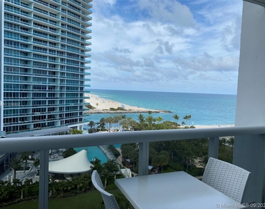 10275 Collins Ave - Photo Thumbnail 1