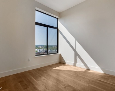 55-27 Myrtle Ave #405 - Photo Thumbnail 2