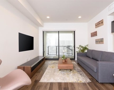 1319 N Martel Ave Apt 106 - Photo Thumbnail 0