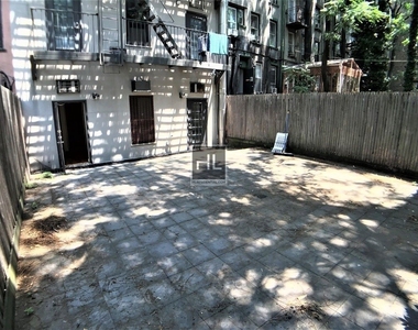 East 6 Street - Photo Thumbnail 9