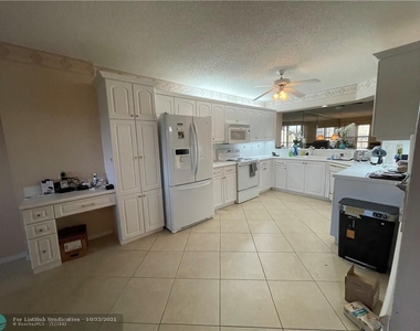 7653 Granville Dr - Photo Thumbnail 2