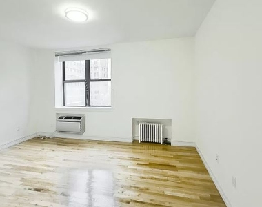 238 East 36th Street - Photo Thumbnail 2